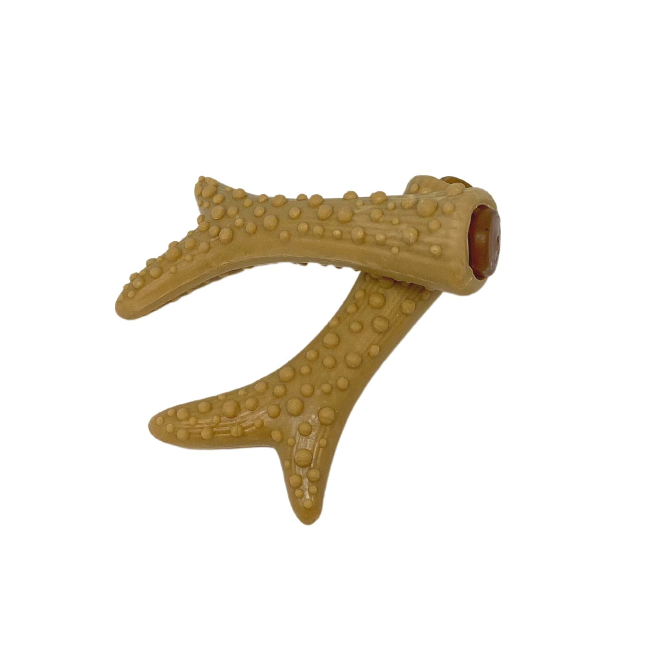 A natural vegetable, peanut butter and banana filled antler-shaped dog chew treat
