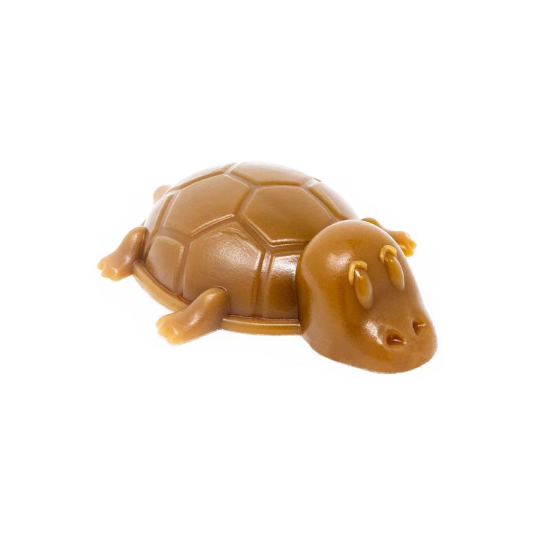 A medium-sized turtle-shaped dog chew treat made of vegetable and peanut butter